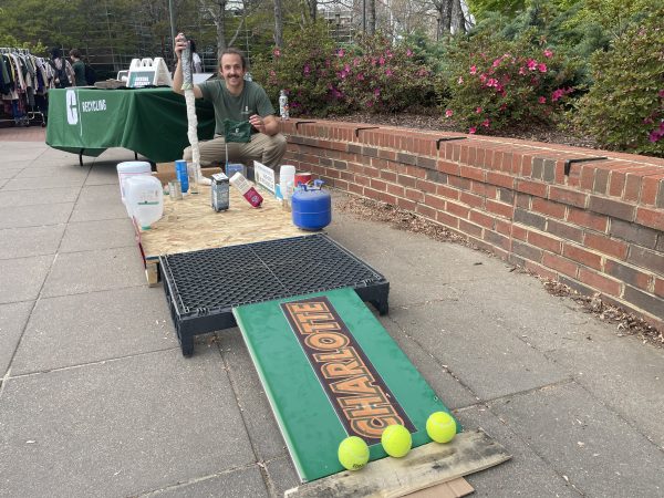 Nich posting with a handmade putt-putt course